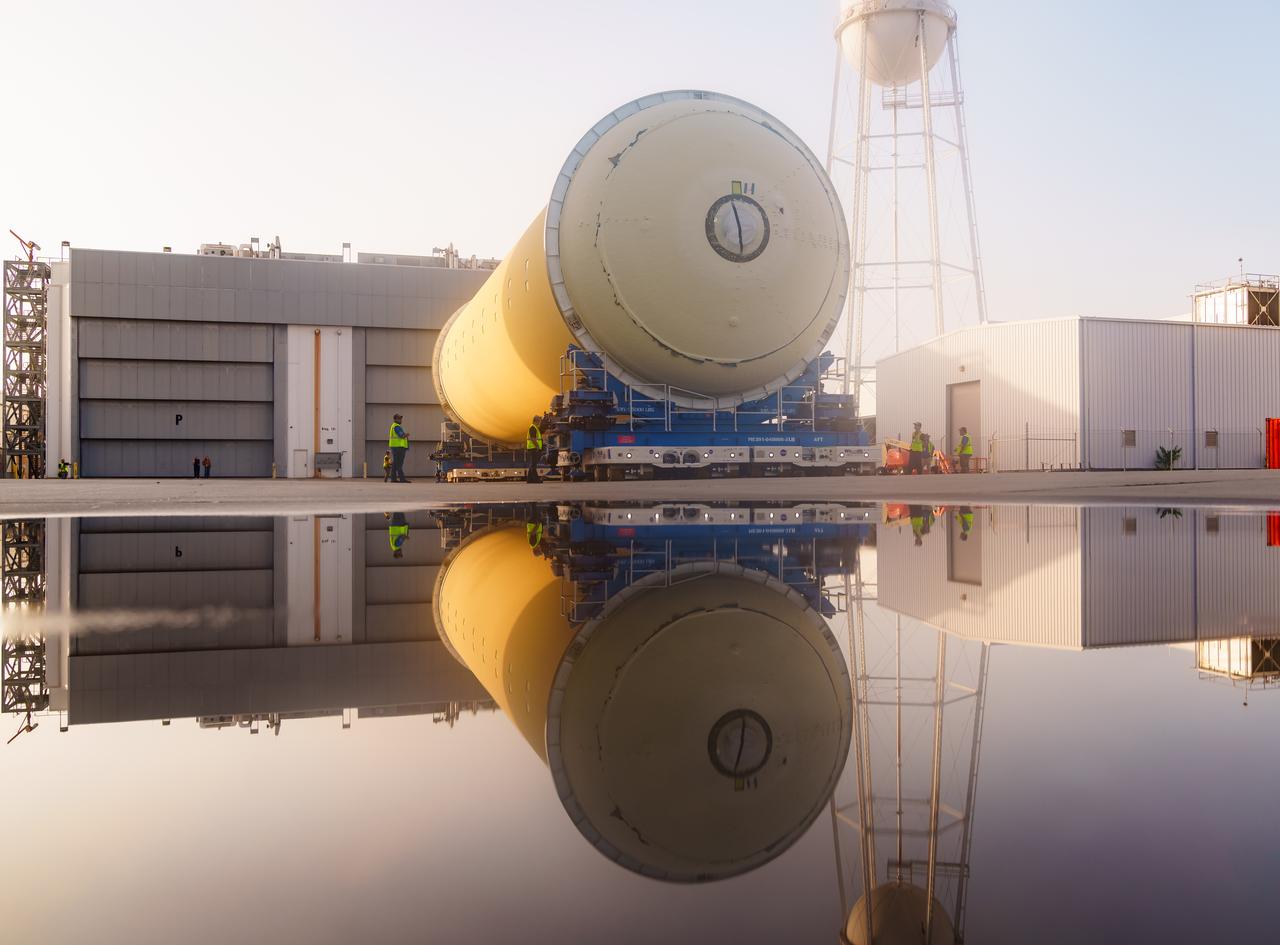 Teams at NASA’s Michoud Assembly Facility in New Orleans move a liquid hydrogen tank for the agency’s SLS (Space Launch System) rocket into the factory’s final assembly area on April 22. Having recently completed application of the thermal protection system, teams will now continue outfitting the 130-foot-tall tank with critical systems to ready it for its designated Artemis III mission. The propellant tank is one of five major elements that make up the 212-foot-tall rocket stage. The core stage, along with its four RS-25 engines, produce more than two million pounds of thrust to help launch NASA’s Orion spacecraft, astronauts, and supplies beyond Earth’s orbit and to the lunar surface for Artemis.